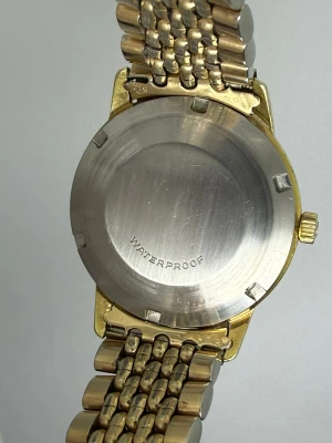 Omega Genève Automatic 34mm Gold Capped Beads of Rice Bracelet Reference 166.037 1968